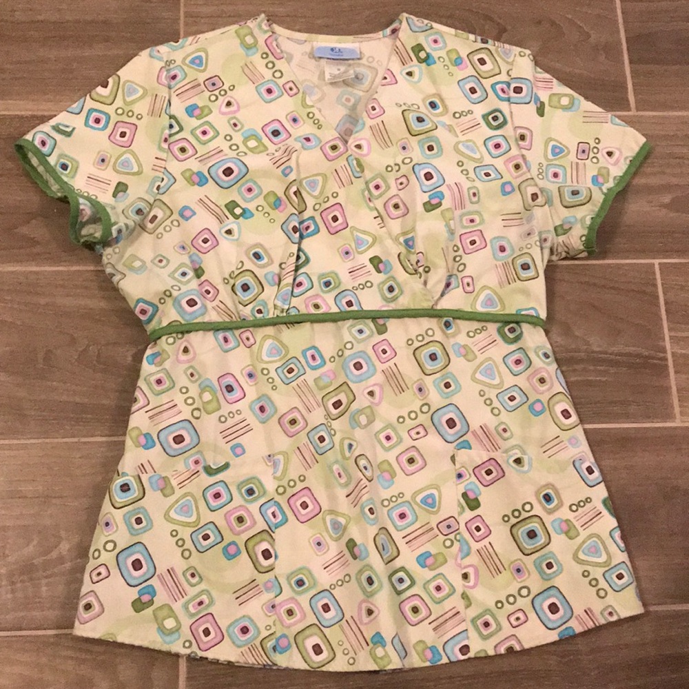 Scrub top green design with empire cinch